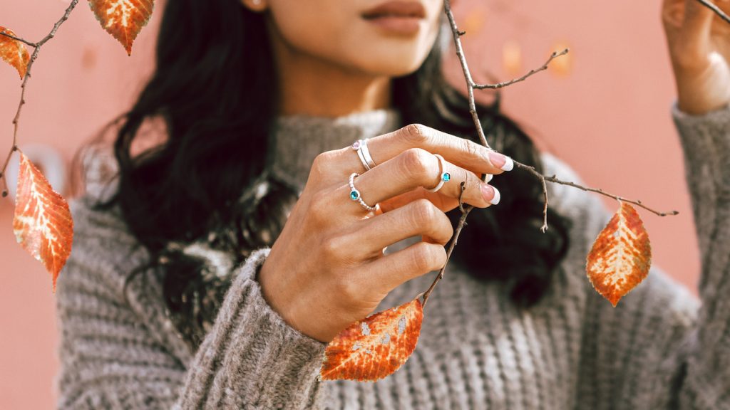 Model wearing the birthstone rings